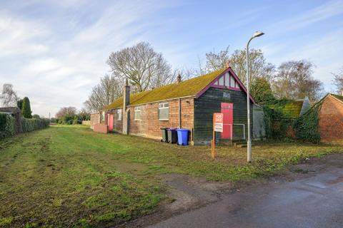 Land, in Davids Lane, £90,000