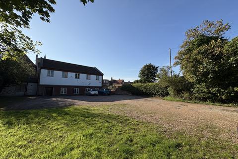 Land, in Land rear of 35 Market Place, £110,000