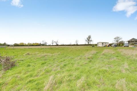 Land, in Doddington Road, £215,000