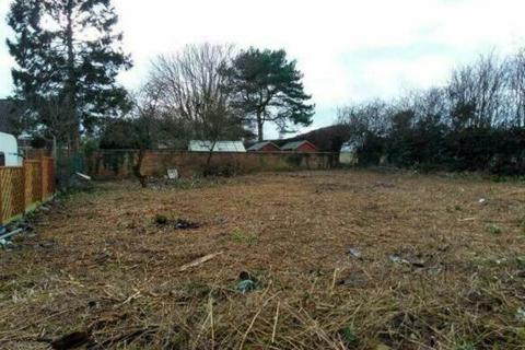 Land, in Grimsby Road, £80,000