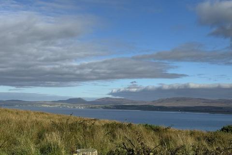 Land, in Port Charlotte, £100,000