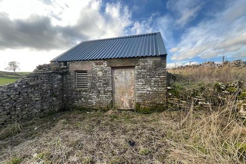 Land, in Land & Building at Pikehall, £80,000