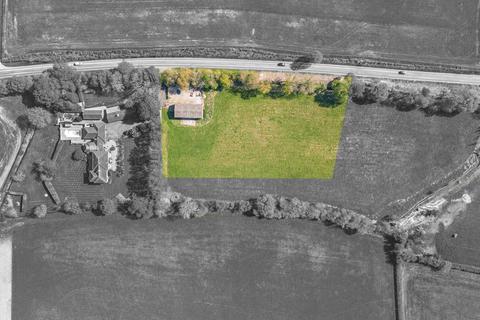 Land, in Chinnor Road, £400,000