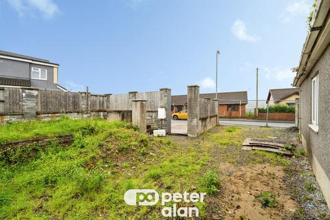 Land, in Talbot Road, £50,000
