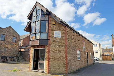 Land, in Off Oundle Road, £250,000