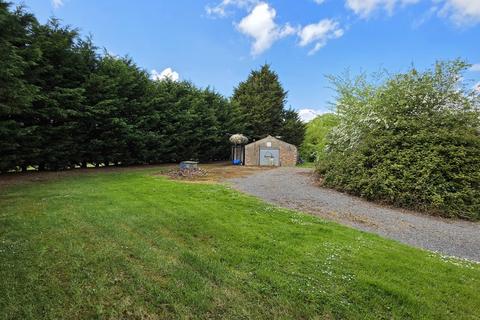 Land, in Church Lane, £150,000