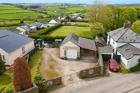 Land, in Kingscott, £125,000