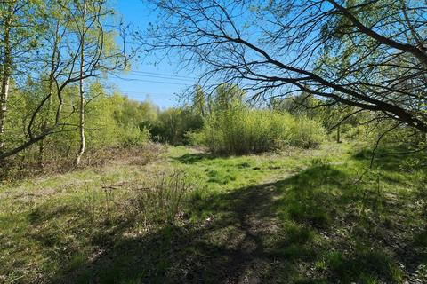 Land, in 24.5 Acre Site At Roman Camp, £128,000
