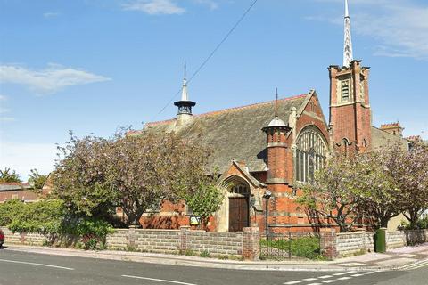 Land, in Morton Road, £250,000