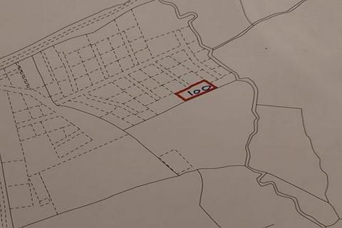 Land, in Plot 100, £8,000