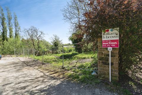 Land, in High Street, £70,000