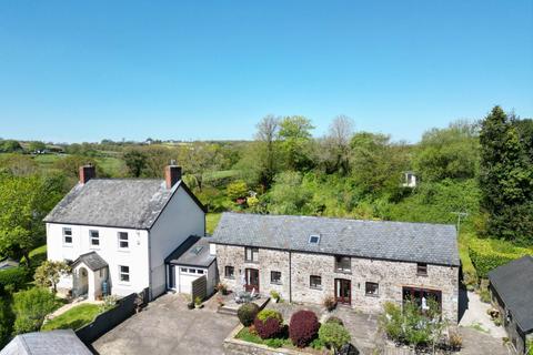 8 bed property, in Newton St Petrock, £799,950