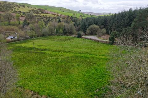 Land, in Llandrindod Wells, £10,000