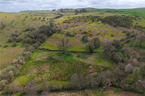 Land, in Llandrindod Wells, £30,000