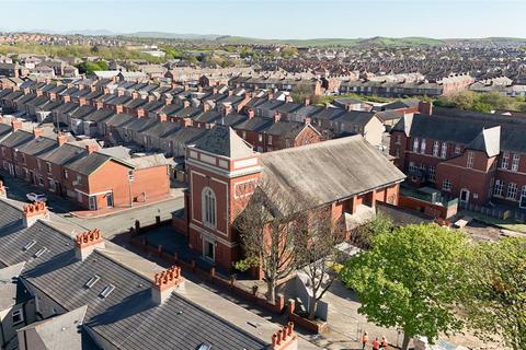 Land, in Sacred Heart Church, £200,000