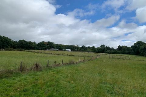 Land, in Bridestowe, £125,000