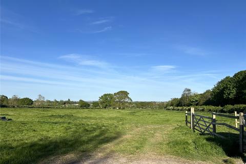 Land, in Foldhill Lane, £100,000