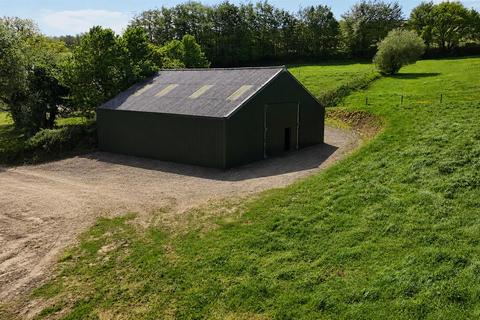 Land, in Atherington, £350,000