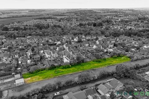 Land, in Neale Street, £350,000