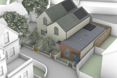 Land, in High Street, £425,000