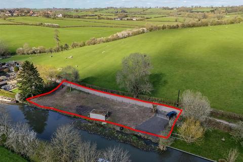 Land, in Dark Lane, £50,000