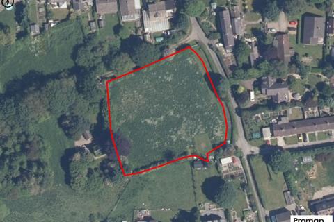 Land, in Newtown, £100,000