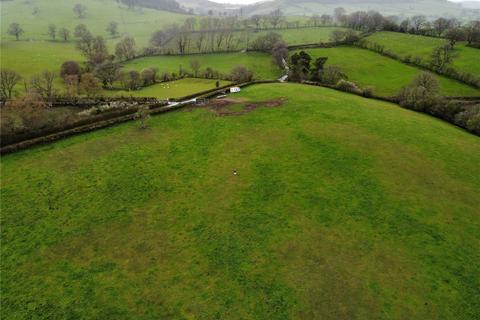 Land, in Franksbridge, £120,000