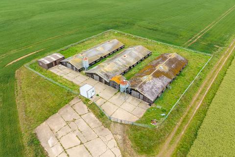 Land, in Norwich Road, £400,000