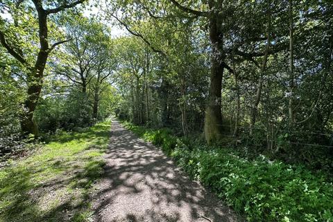 Studio, in School Lane, £23,000