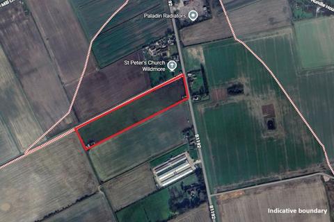 Land, in Langrick Road, £100,000