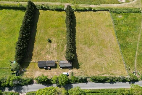 Land, in Hall Lane, £40,000
