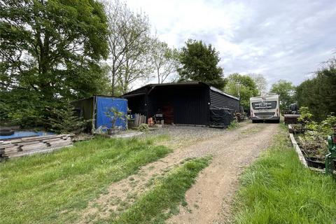 Land, in Jackdaw Hill, £45,000