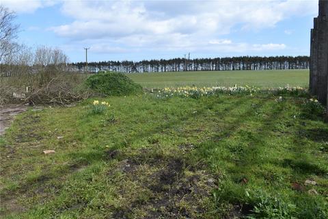 Land, in Main Street, £140,000