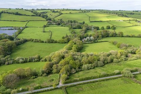 Land, in Shillingford, £100,000