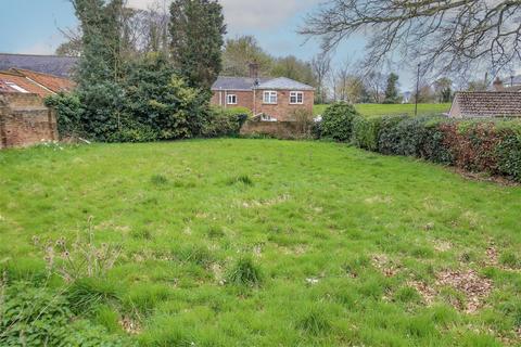 Land, in High Street, £45,000