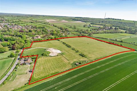Land, in Ecchinswell Road, £1,500,000