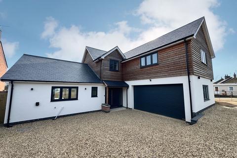 Land, in 31A Vicarage Lane, £725,000