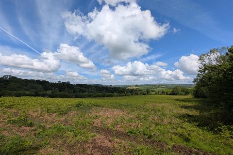 Land, in Latchley, £100,000