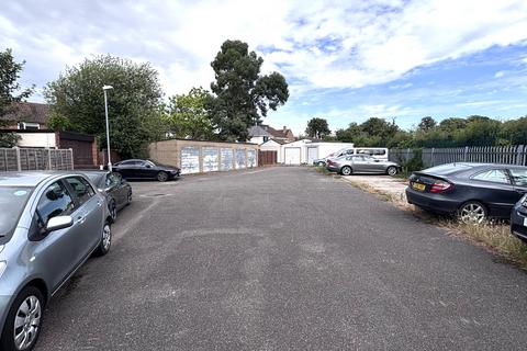 Land, in Garage Compound 2, £50,000