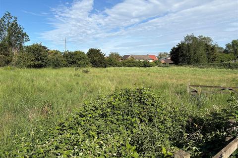 Land, in Two Building Plots, £750,000