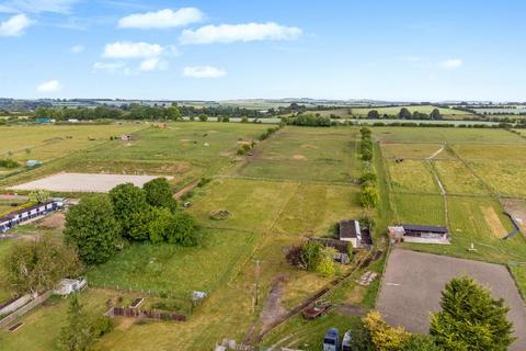 Land, in East Gomeldon Road, £240,000