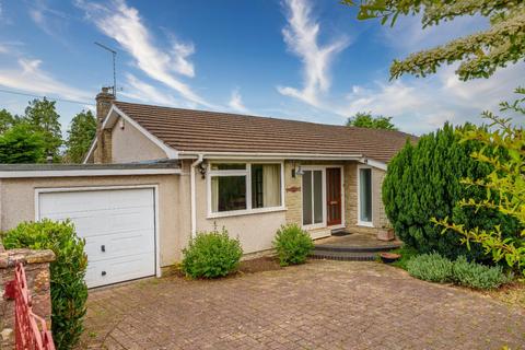 4 bed property, in Detached bungalow with a beautiful outlook over Claverham's countryside, £550,000