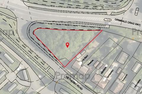 Land, in Wetherby Road, £20,000