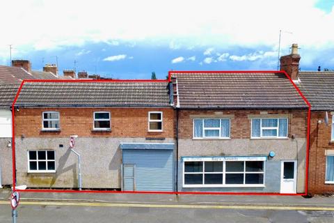 Land, in Wellington Street, £320,000