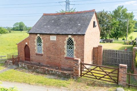 Studio, in Stanwardine, £125,000
