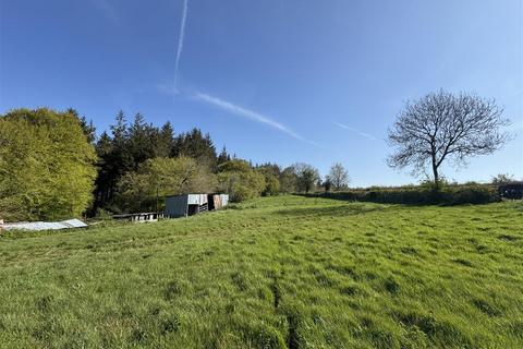 Land, in Culmhead, £50,000