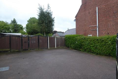 Studio, in Land at side and between 103 & 107, £80,000