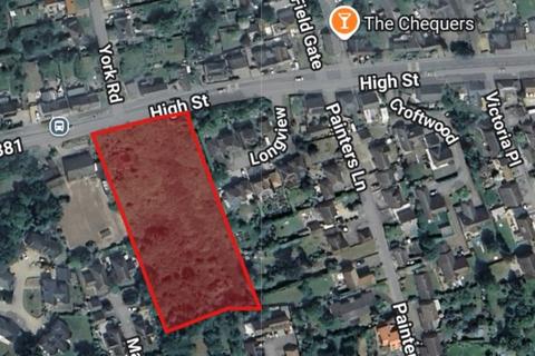 Land, in High Street, £600,000