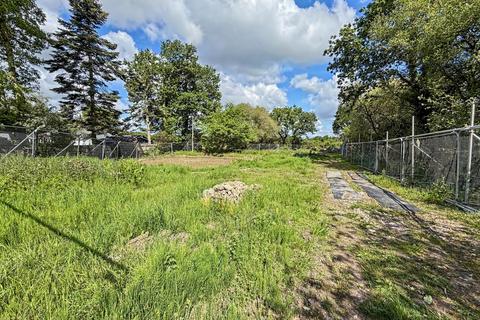 Land, in Colehill, £450,000
