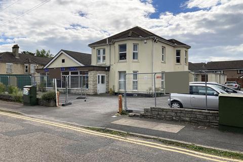 Land, in Charminster, £500,000